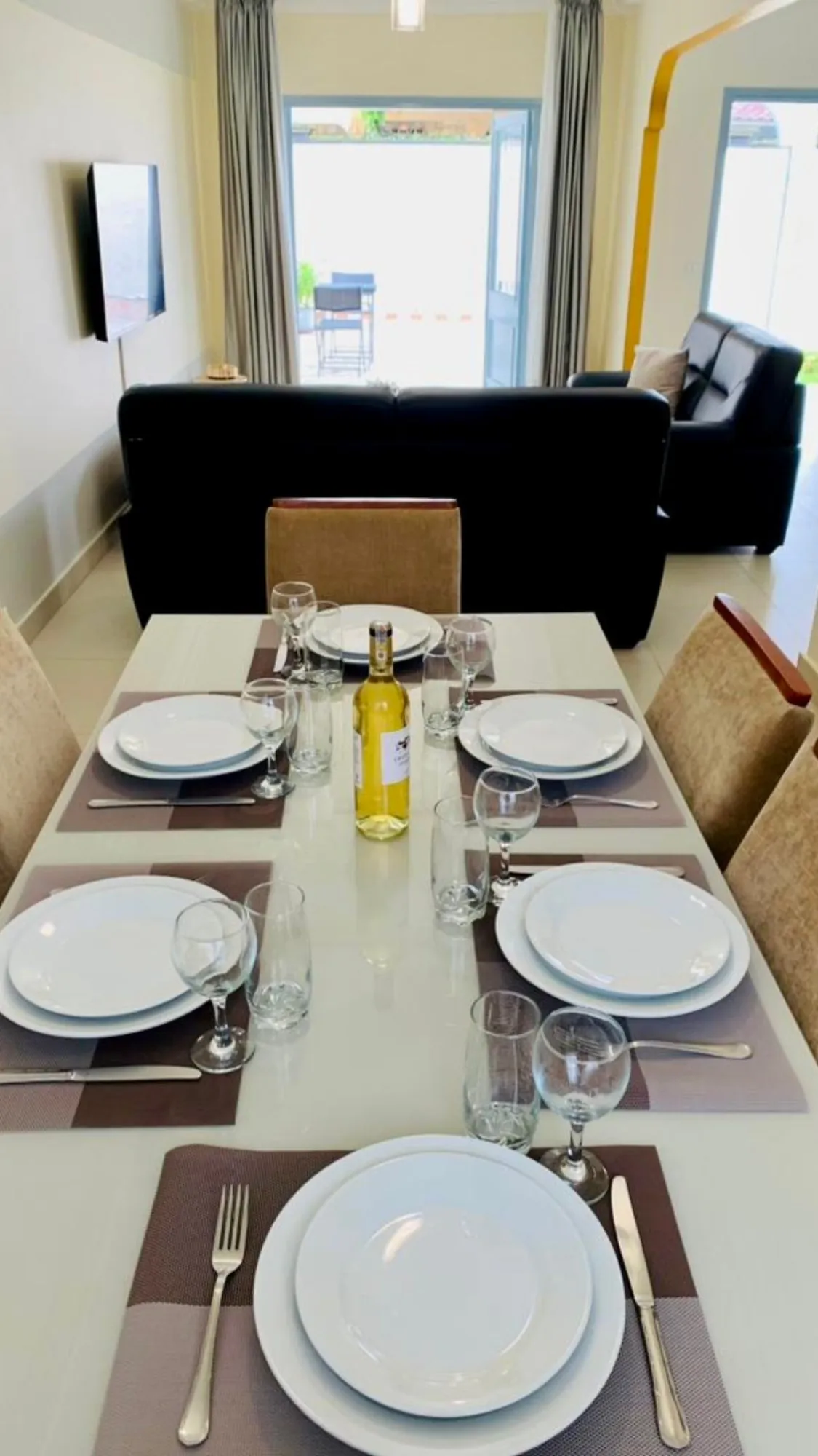 Dining table, set for dinner